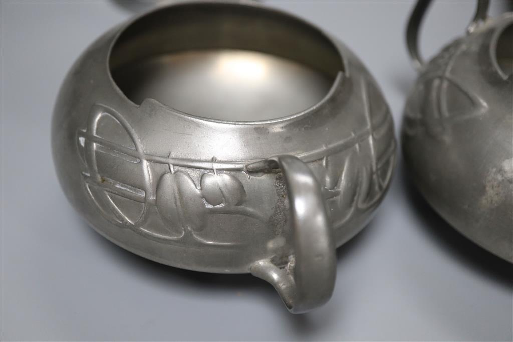 A Libertys Tudric four piece pewter tea set, shape no.0231 - the jug shape no.0281, 19cm